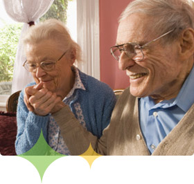 Elderly woman caretaker supporting Alzheimer's patient